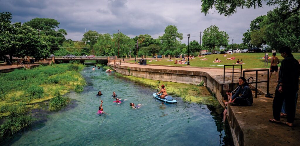 People paddling on the San Marcos River.